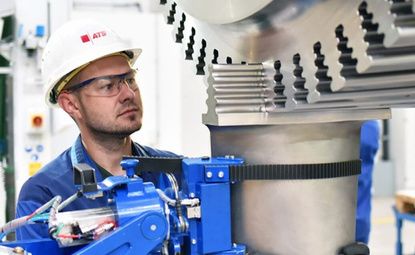Engineer inspecting mechanical equipment